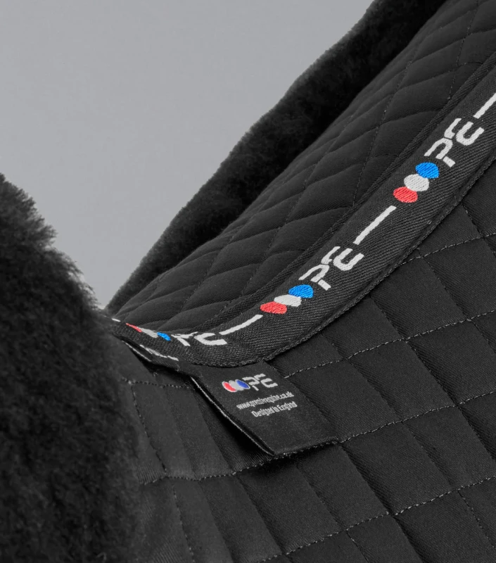 Czaprak VSskokowy wycięty z wełną owczą Premier Equine 3.webp